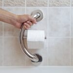 toilet paper holder support